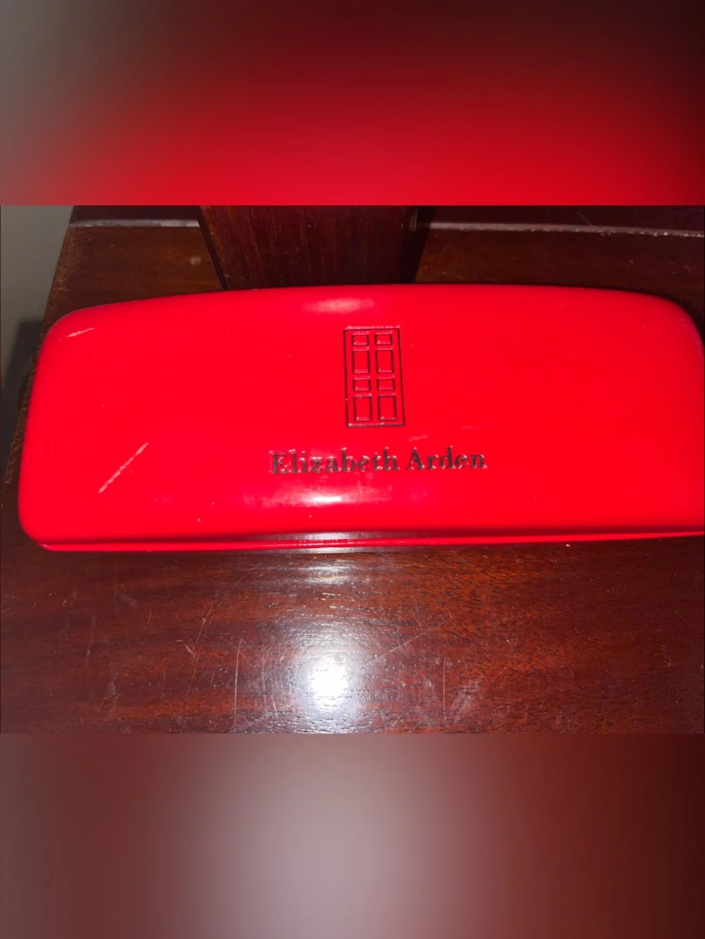 Elizabeth Arden Black Rectangular Sunglasses with Red Accents